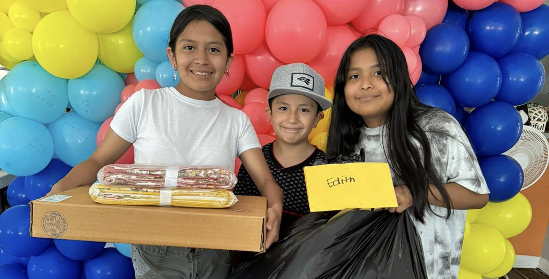 Children who received goods donated from Amazon.