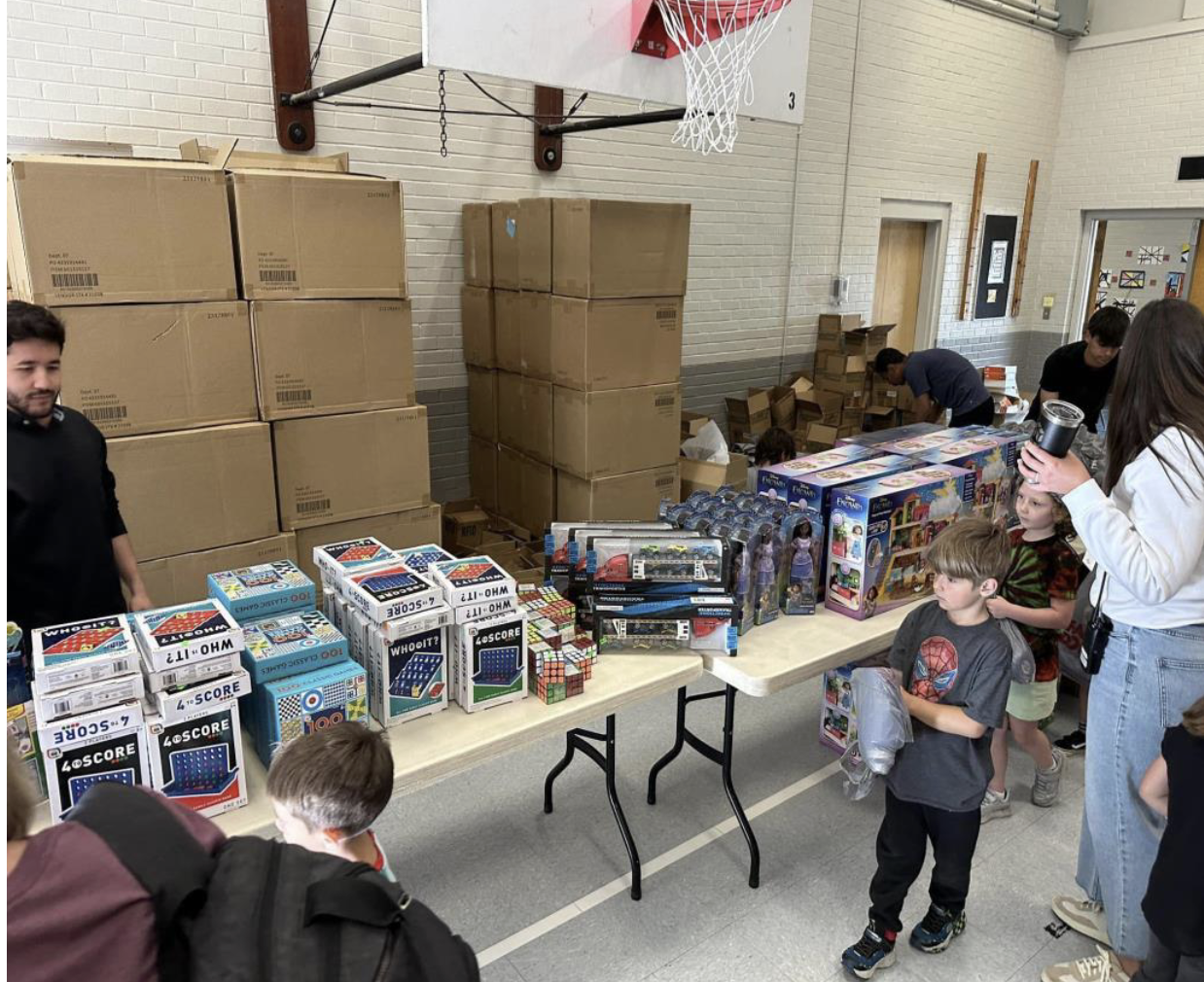 A child receiving a toy donation.