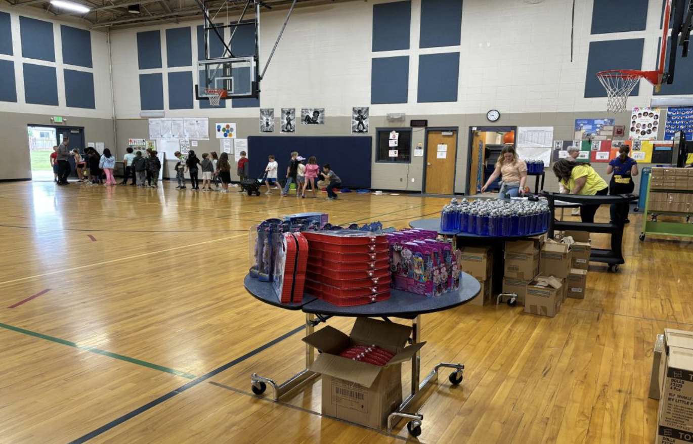 Toys for Tots donation event in a gym.